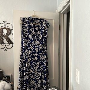 Navy and black background with white flowers Chaps dress.